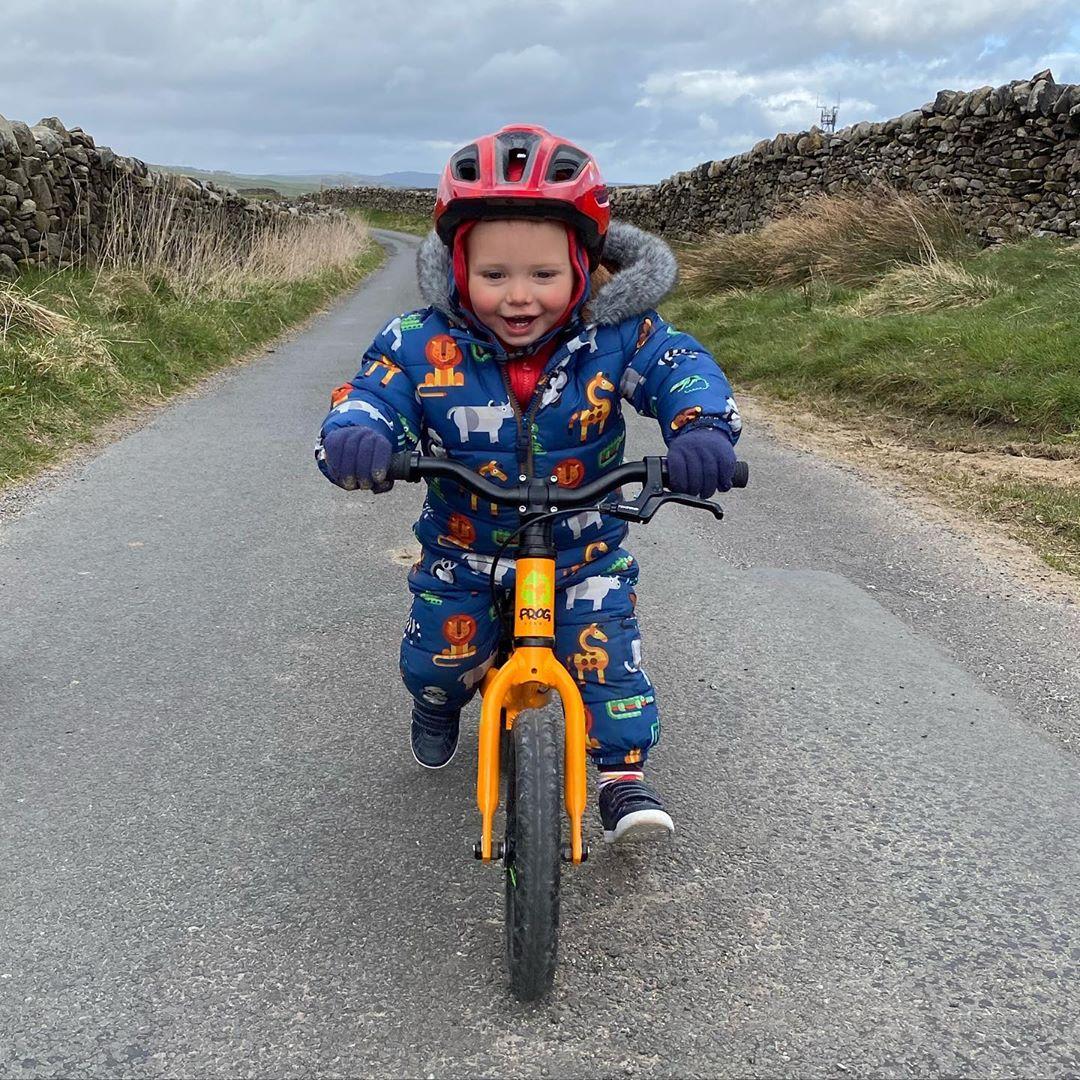 image of a small boy on his balance bike scooting along taken by instagram @markhanson84
